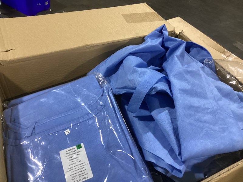 Condition photo showing As Is for disposable ppe isolation medical gowns 40pack – level 2, full back coverage, double tie closure, sms 35g material, knit cuffs, unisex, professional blue for healthcare & lab use