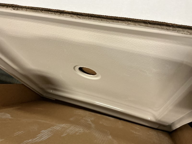 Condition photo showing Good Condition for dreamline slimline 32 in. d x 32 in. w x 2 3/4 in. h center drain single threshold shower base in white, dlt-1132320