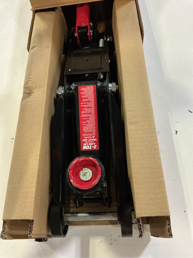 Condition photo showing Good Condition for hyper tough trolley jack, 2 ton capacity, heavy-duty cast iron, adjustable 5-1/8