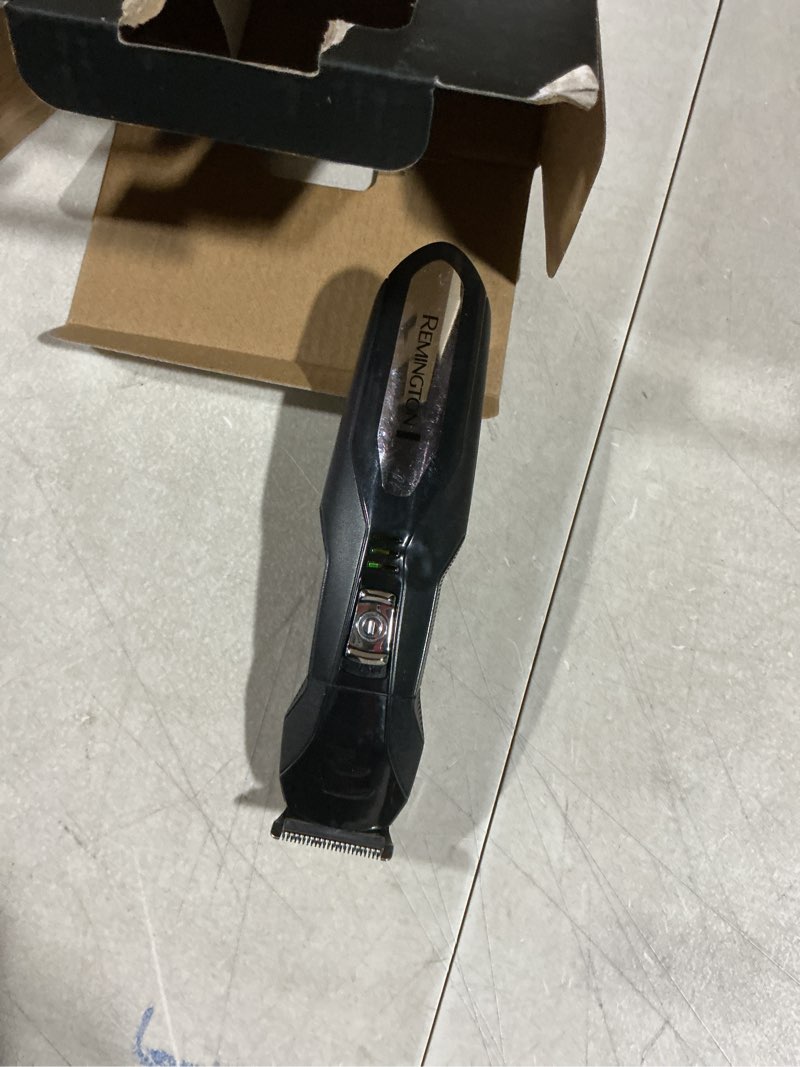 Condition photo showing As Is for Remington All-in-One Grooming Kit, Lithium Powered, 8 Piece Set with Trimmer, Men's Shaver, Clippers, Beard and Stubble Combs, PG6025, Black Black 8-piece set