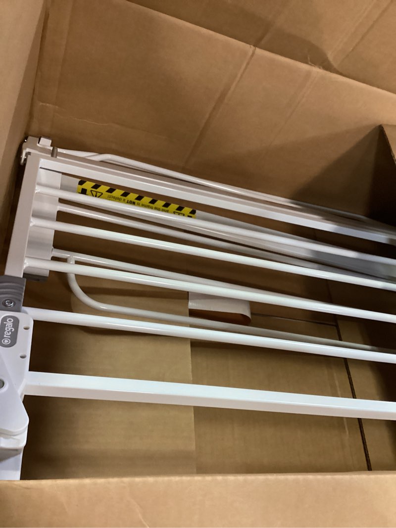 Condition photo showing As Is for Regalo 38.5-Inch Extra Wide Baby Gate – Pressure Mount Baby and Pet Safety Gate for Bottom of Stairs & Doorways – Tested and Trusted, American Designed, American Owned White 29-38.5"W x 30"H