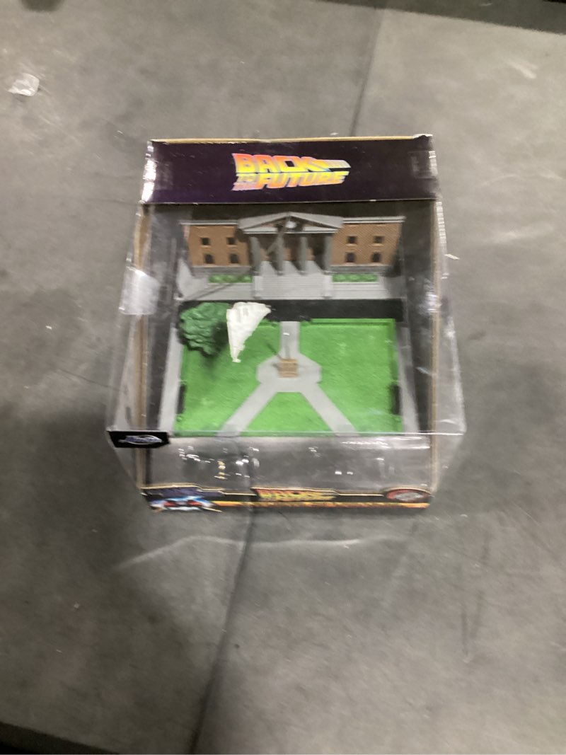 Condition photo showing Good Condition for incomplete  jada nanoscene back to the future hill valley courthouse diorama – movie-inspired miniature diorama incl. 2 iconic vehicles (time machine & toyota pickup) – collectible scene for adults and kids