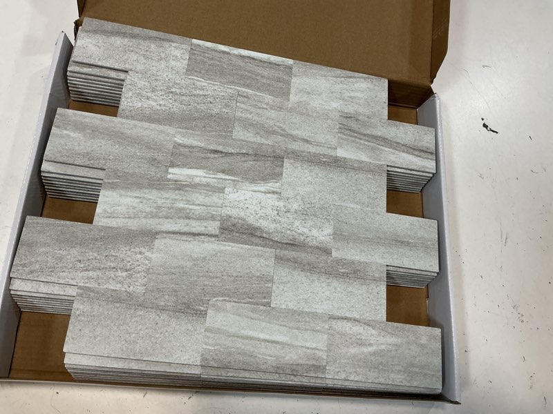 Condition photo showing Good Condition for Art3d 10-Pack Peel and Stick Wall Tile for Backsplash, Stick on Stone Tile for Kitchen Bathroom Fireplace Vanitity in Biege Marble Biege Marble 11.3"x13.5"