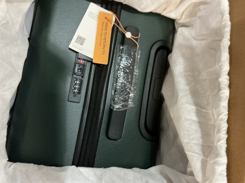 Condition photo showing New/Like New for Expandable Medium Check-In Suitcase, Dark Green