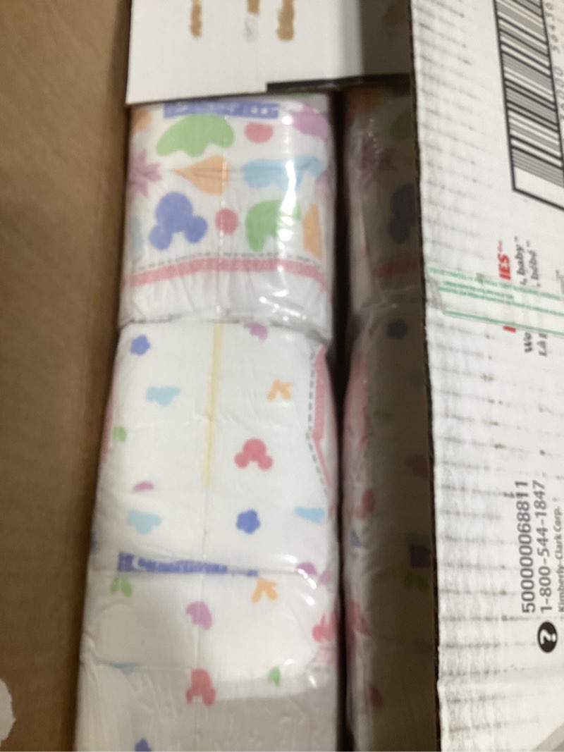 Condition photo showing New/Like New for huggies size 5 diapers, snug & dry baby diapers, size 5 (27+ lbs), 84 count, packaging may vary size 5 84