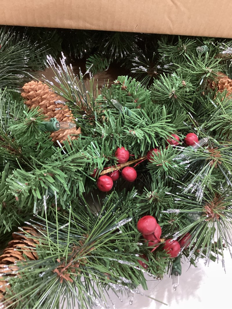 Condition photo showing Good Condition for National Tree Company 24 in Pre-Lit Crestwood Spruce Artificial Christmas Wreath, Christmas Decoration with Glitter, Pinecones, Red Berries, 50 Clear Lights, 160 Tips, Green