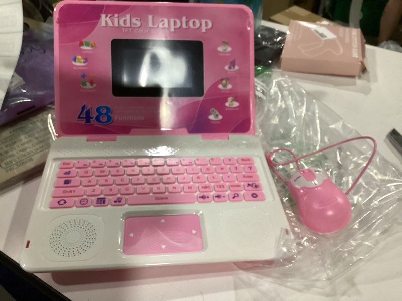 Condition photo showing As Is for kids laptop, educational color screen laptop with 48 learning modes, laptop for kids ages 5+ pink