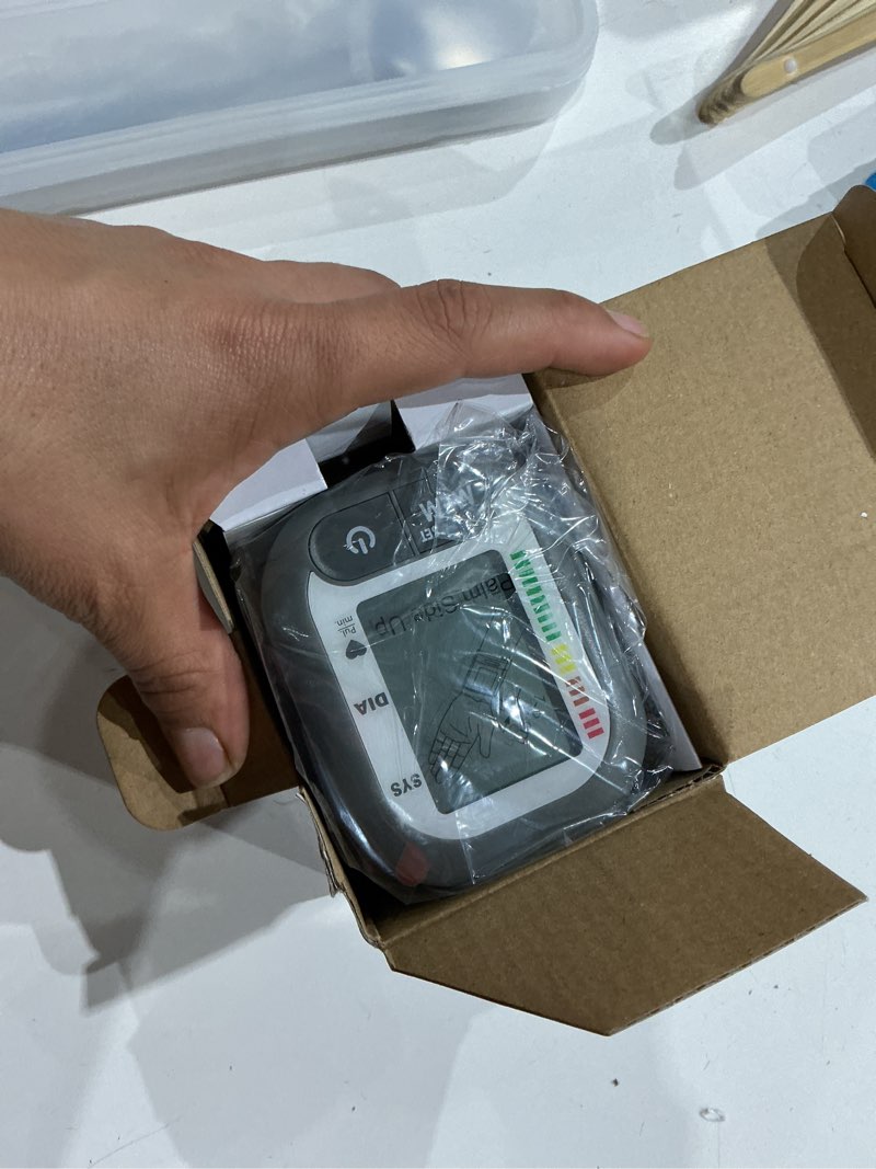 Condition photo showing Good Condition for medline digital wrist blood pressure monitor, wearable, digital lcd display, stores up to 60 readings, batteries included