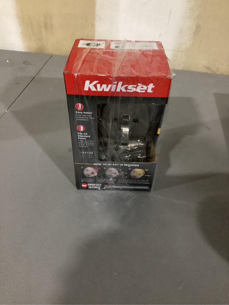Condition photo showing As Is for kwikset single cylinder deadbolt with smartkey security technology, designed to fit standard doors with a thickness of \(1\frac{3}{8}\) to \(1\frac{3}{4}\) inches. 