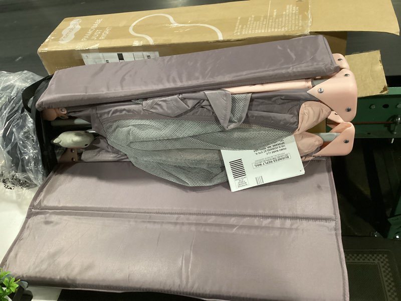Condition photo showing New/Like New for pamo babe pack and play with bassinet, pink portable playard for baby