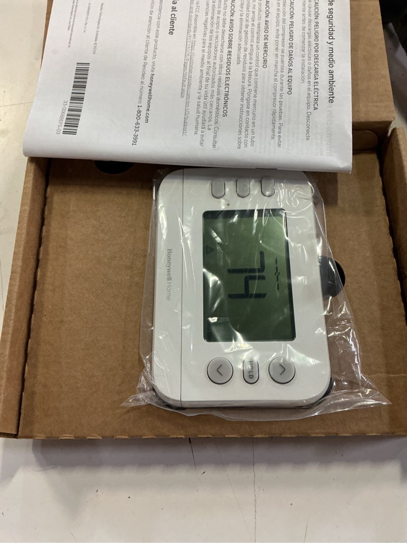 Condition photo showing New/Like New for honeywell home x2p heating and cooling push button programmable thermostat