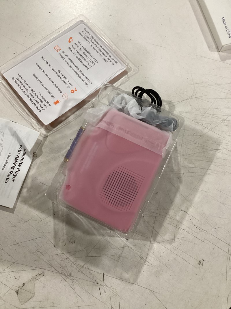Condition photo showing Good Condition for cassette player tape recorders am/fm radio, portable tape player records built in speakers manual record - 2aa battery or dc 5v supply with 3.5mm earphone- pink