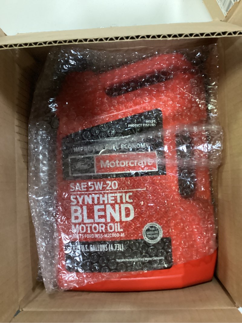 Condition photo showing New/Like New for GENUINE FORD FLUID 5W-20 PREMIUM SYNTHETIC BLEND MOTOR OIL - 5 QUART JUG