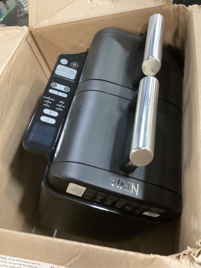 Condition photo showing As Is for ninja air fryer, 8 qt doublestack 2-basket, space saving design, cooks 2lb chicken wings, feeds up to 6 people, 6-in1 air fryer, roast, bake & more, easy to clean, dishwasher safe parts, black, sl201