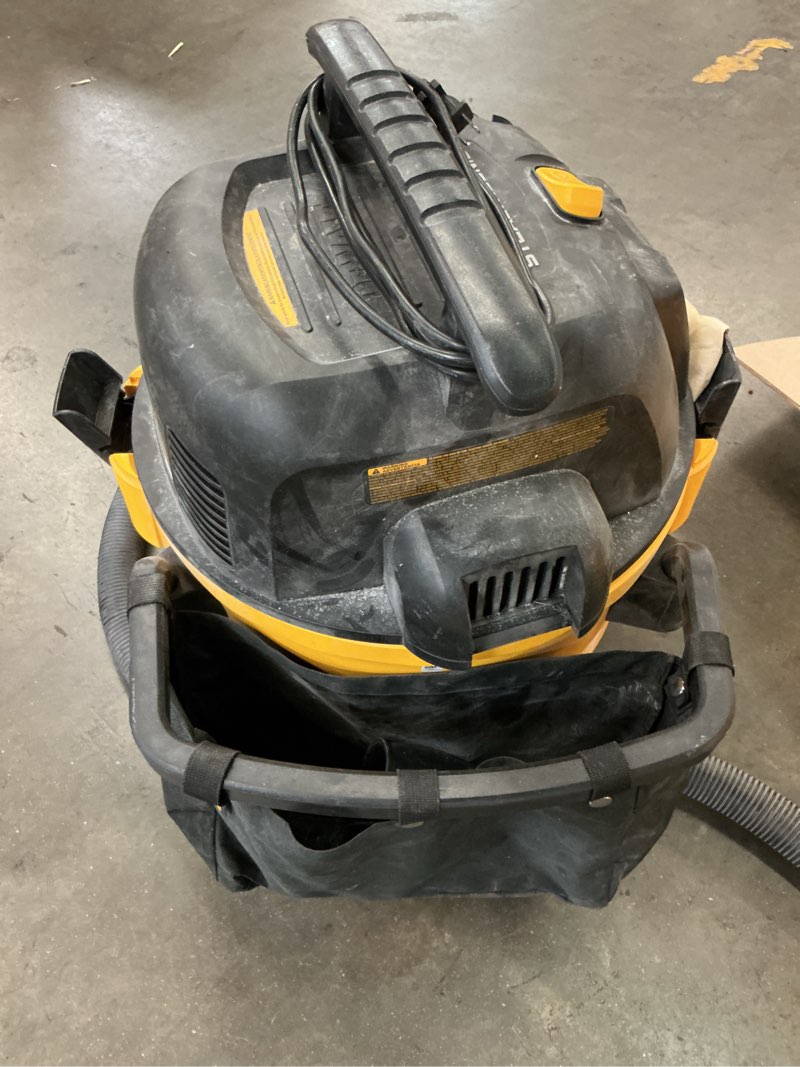 Condition photo showing As Is for dewalt stealthsonic quiet 12-gallon 5.5 hp corded wet/dry shop vacuum
