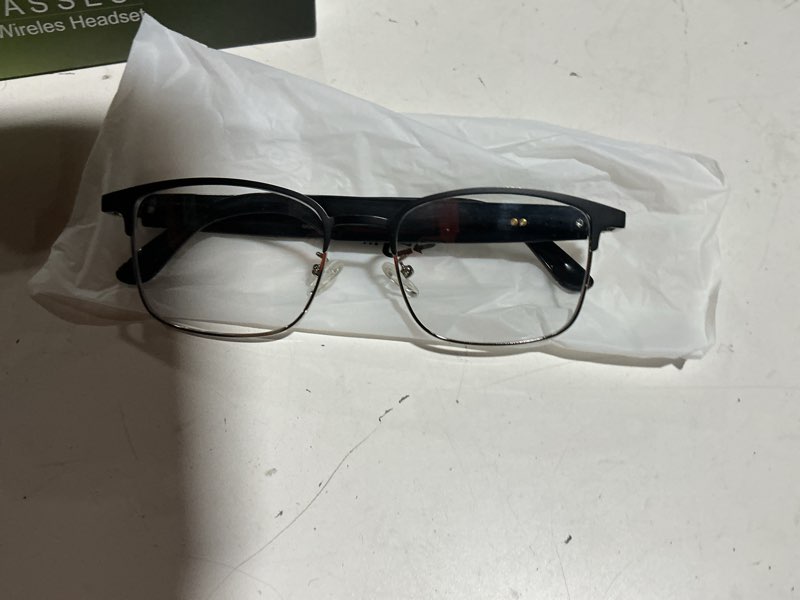 Condition photo showing As Is for bluetooth audio smart glasses, blue light glasses for women men, remote shooting, open ear sound mic & speakers, magnetic charging, color-changing polarized sunglasses lenses, voice assistant?gs06s) black-bright silver