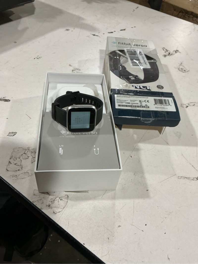 Condition photo showing Good Condition for fitbit versa lite smartwatch,gps,charcoal/silver aluminum, one size (s & l bands included)