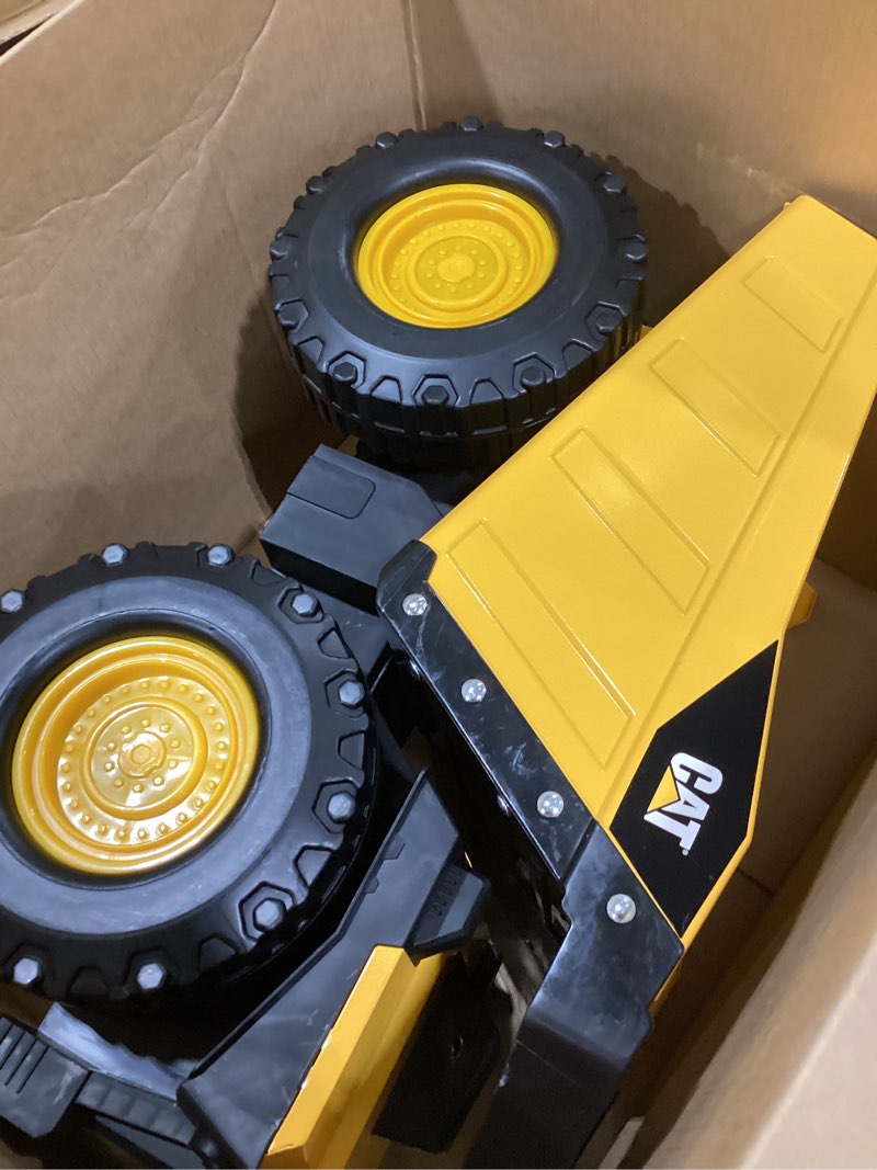 Condition photo showing As Is for CAT Construction Toys, 20" Mighty Steel Dump Truck - Sturdy Steel & Plastic Construction - Real Working Dump Bin - Ideal for 3+ Yr Olds -Built to Last, Yellow