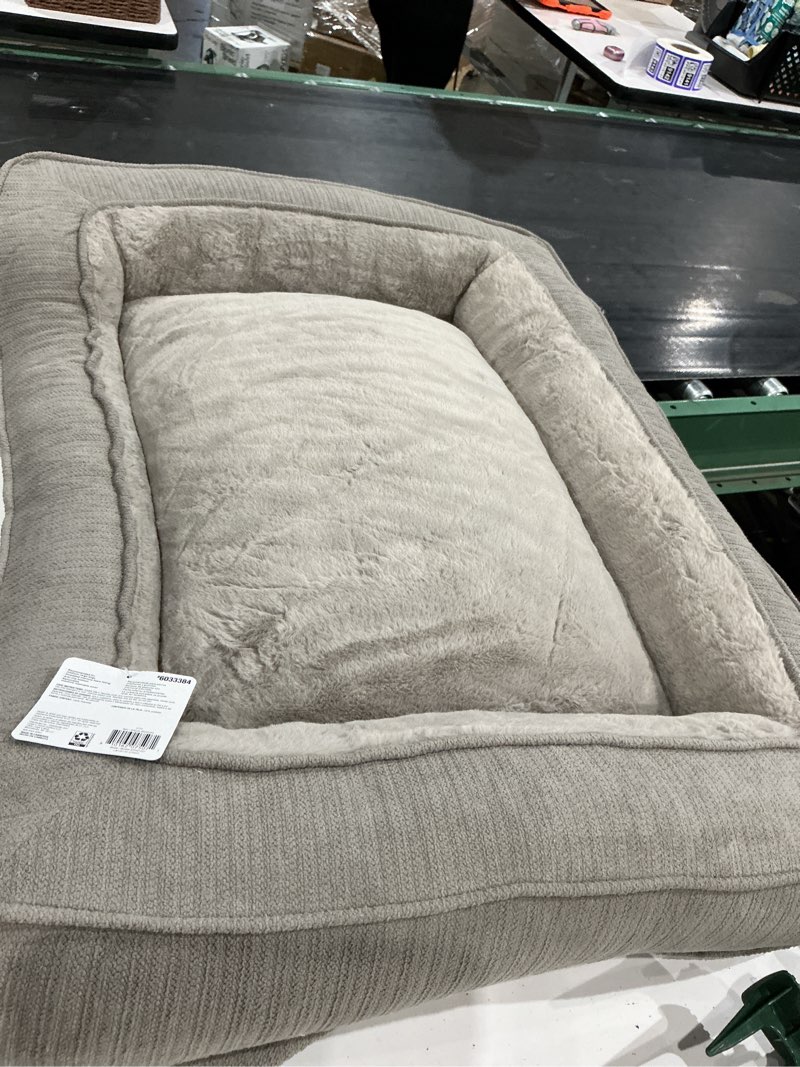 Condition photo showing As Is for heart & herd rectangular twill tan polyester bolster dog bed ( medium )
