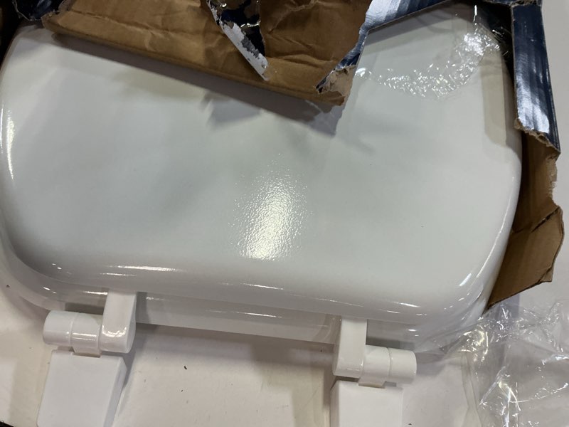 Condition photo showing As Is for project source wood white elongated toilet seat