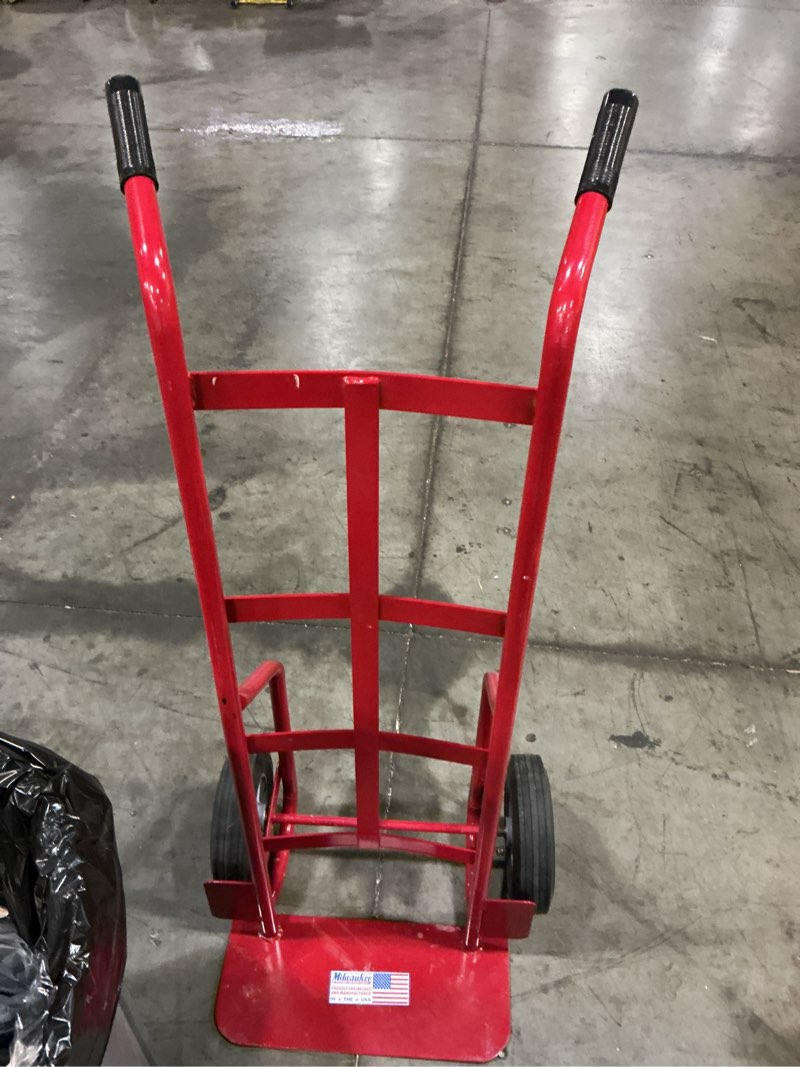 Condition photo showing As Is for milwaukee 800-lb capacity 2 -wheel red steel standard hand truck