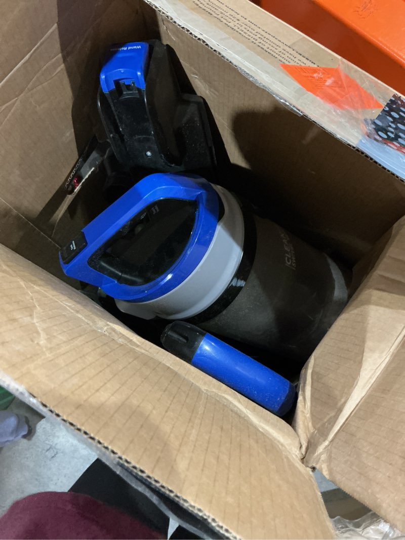 Condition photo showing As Is for bissell cleanview swivel rewind vacuum with automatic cord rewind, turboeraser upholstery tool, triple action brush roll, swivel steering, extension wand, easy-empty dirt tank, multi-cyclonic suction blue