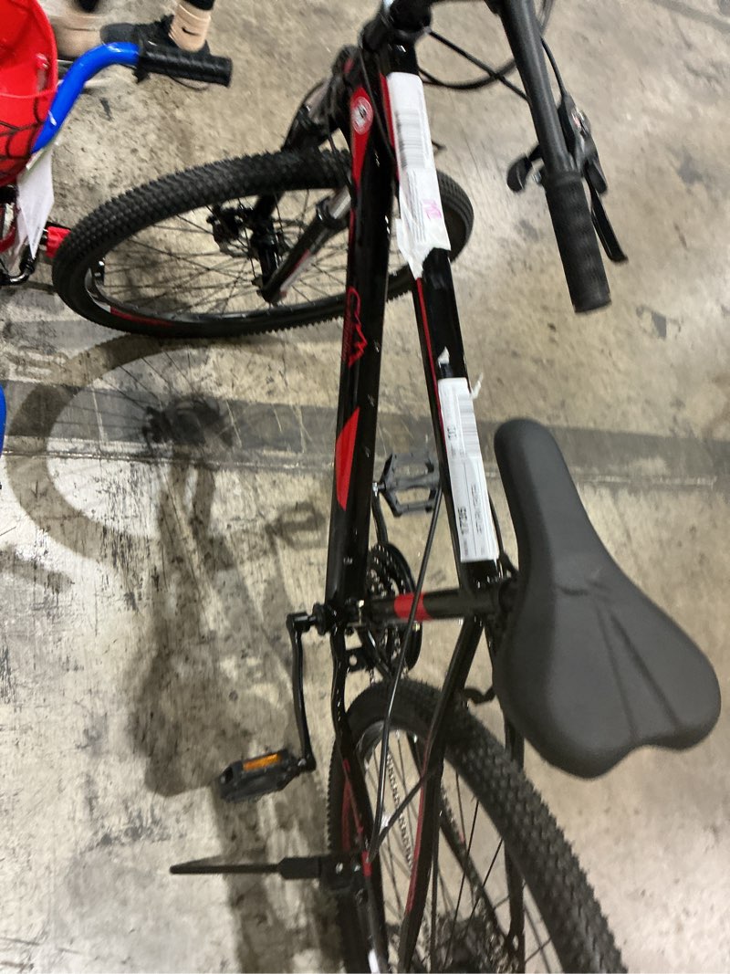 Condition photo showing As Is for damage to the tower )explorer 26\" 21-speed mountain bike, red and black
