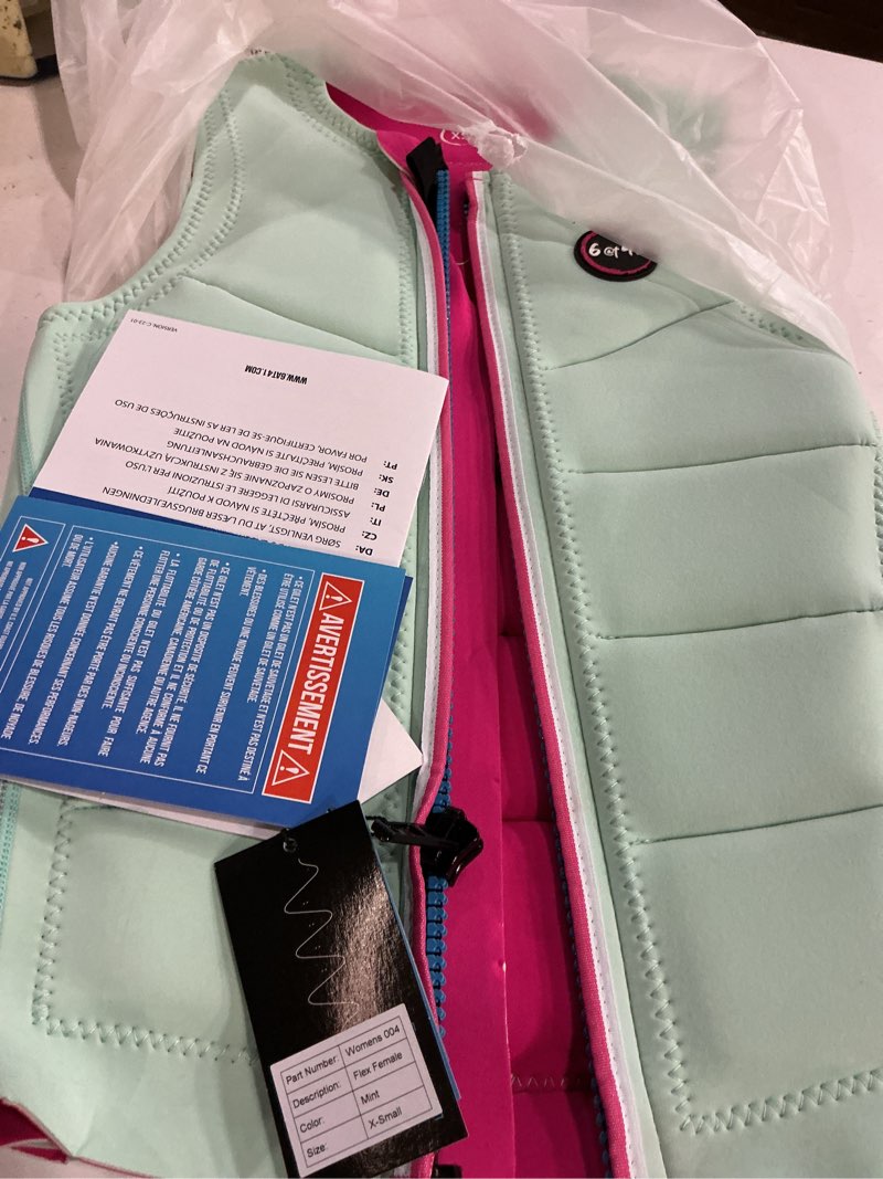 Condition photo showing New/Like New for 6@t41 premium neoprene slalom water ski competition vest, black with pink trim, padded slalom jacket, maximum movement design mint small