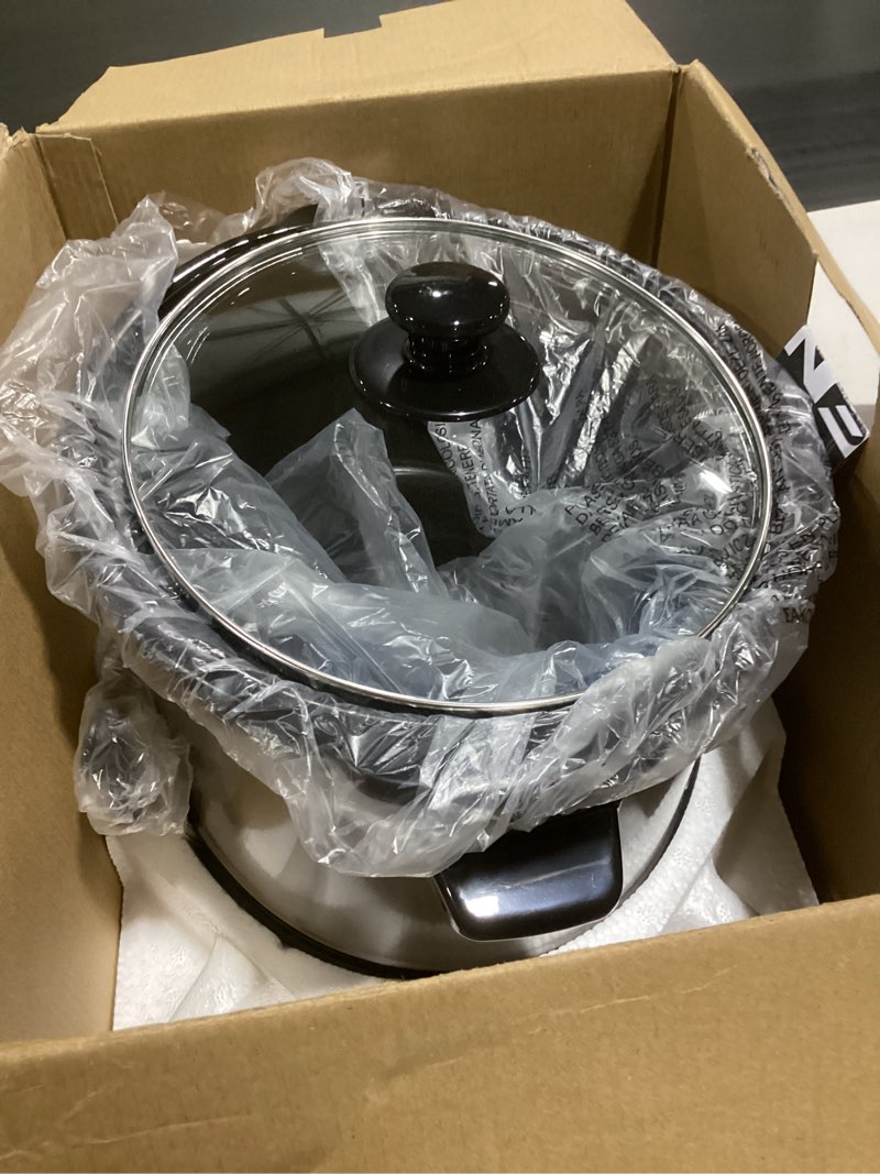 Condition photo showing Good Condition for ovente electric slow cooker with 3 cooking settings, non-stick and dishwasher safe stoneware, stainless steel body, glass lid, 3.7 qt oval pot for entrees, soups, sauces, stews & dips, silver slo35abr