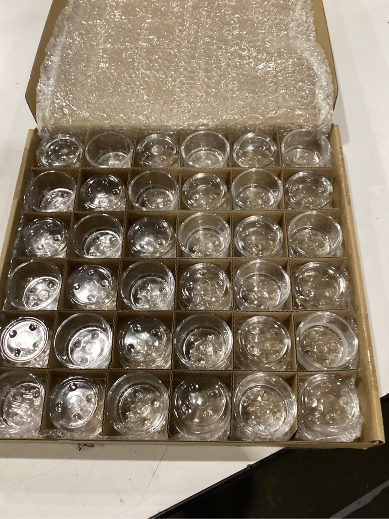 Condition photo showing Good Condition for 36 pack clear glass tealight candle holders, 1.8 inch wide x 1 inch high, for 1.5" tealights, bulk for wedding centerpieces, party, dinner, home decor normal