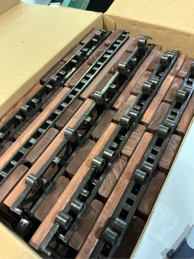 Condition photo showing As Is for thyoi 10 pcs premium acacia wood interlocking deck tiles (12" x 12"), deck flooring outdoor waterproof all weather, tiles for patio, decking for indoor and outdoor use (dark brown 12s, 10 square ft) dark brown 12s 10