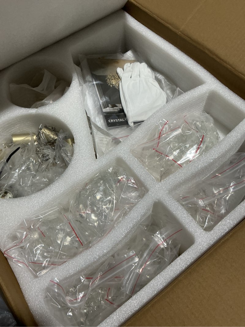 Condition photo showing Good Condition for EGM Gold Crystal Chandelier, 24-Inch Modern Raindrop Light Fixtures 8-Light, Hanging Round Gold Dining Room Crystal Chandelier, Tree Branch Chandeliers for Bedroom Foyer E12 Soft Gold 24 Inch (8 Light)