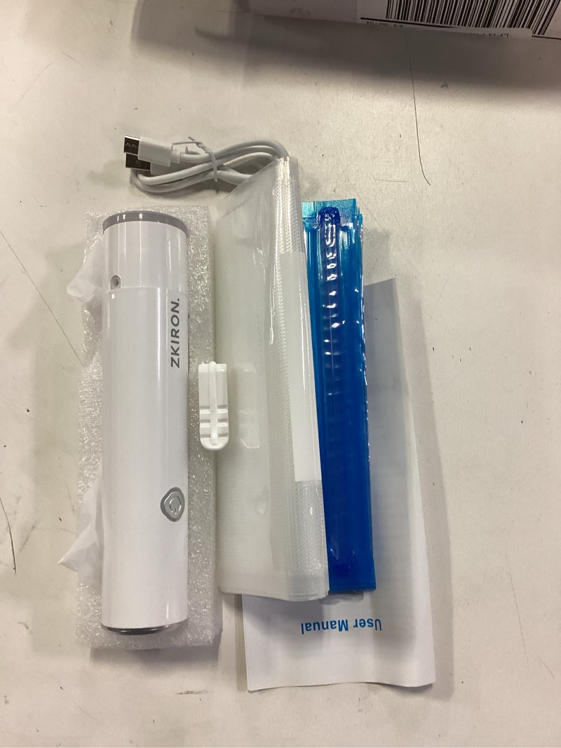Condition photo showing Good Condition for OneTouch Handheld Vacuum Sealer Machine – Rechargeable Mini Food Saver with 5 Reusable Bags, Compact Air Sealing Device for Sous Vide, Meal Prep, and Kitchen Storage (White) 1 Machine + 5 Vacuum Zipper Bags