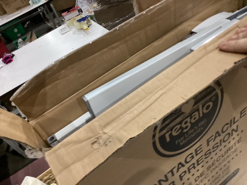 Condition photo showing As Is for Regalo Safety 38" Baby Gate for Doorways & Bottom of Stairs, Pressure Mount Design for Babies, Toddlers & Pets, Tested & Safe for 30 Years, American Designed, American Owned, White White 29-38.5"W x 30"H