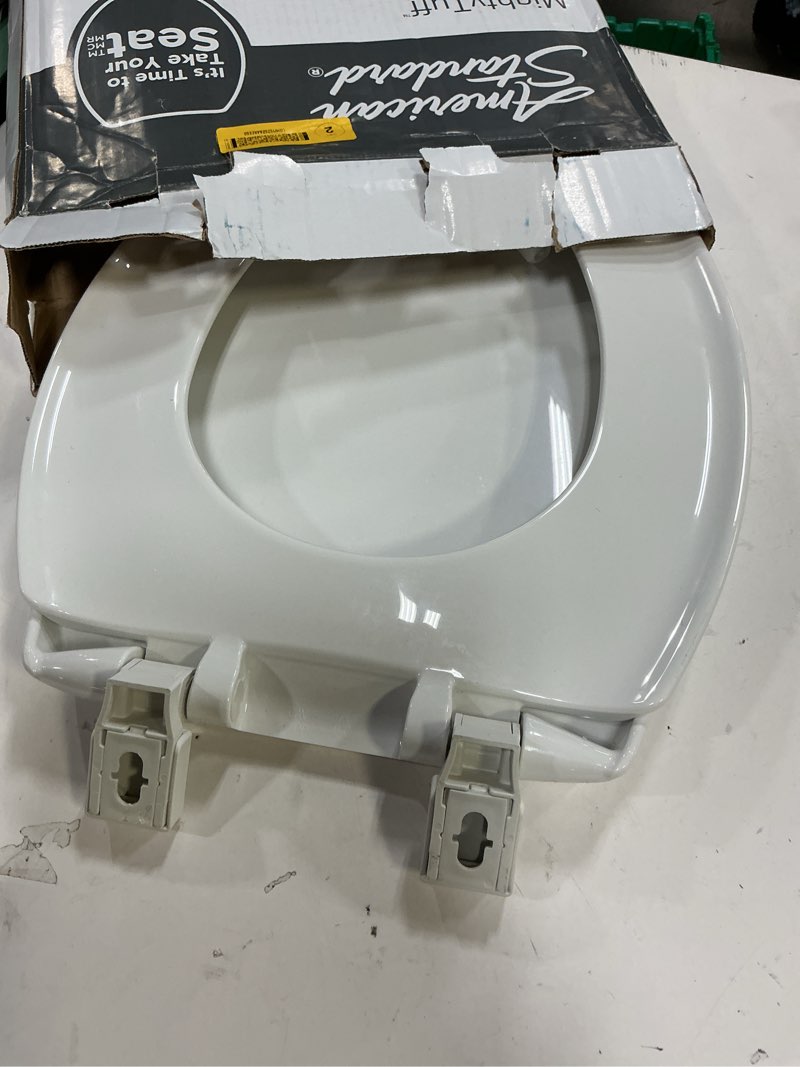 Condition photo showing As Is for american standard mightytuff bone elongated slow-close toilet seat