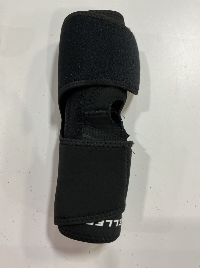 Condition photo showing As Is for mueller self adjusting knee stabilizer, black, one size fits most