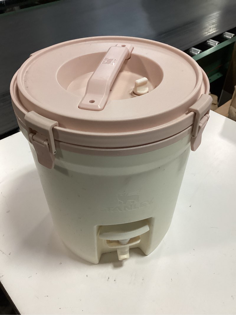 Condition photo showing As Is for STANLEY Adventure Fast Flow Water Jug 2 Gallon Leakproof Ice Water Dispenser Insulated Beverage Cooler Easy Pour Spigot and Latched Foam Lid BPA-Free Rose Quartz
