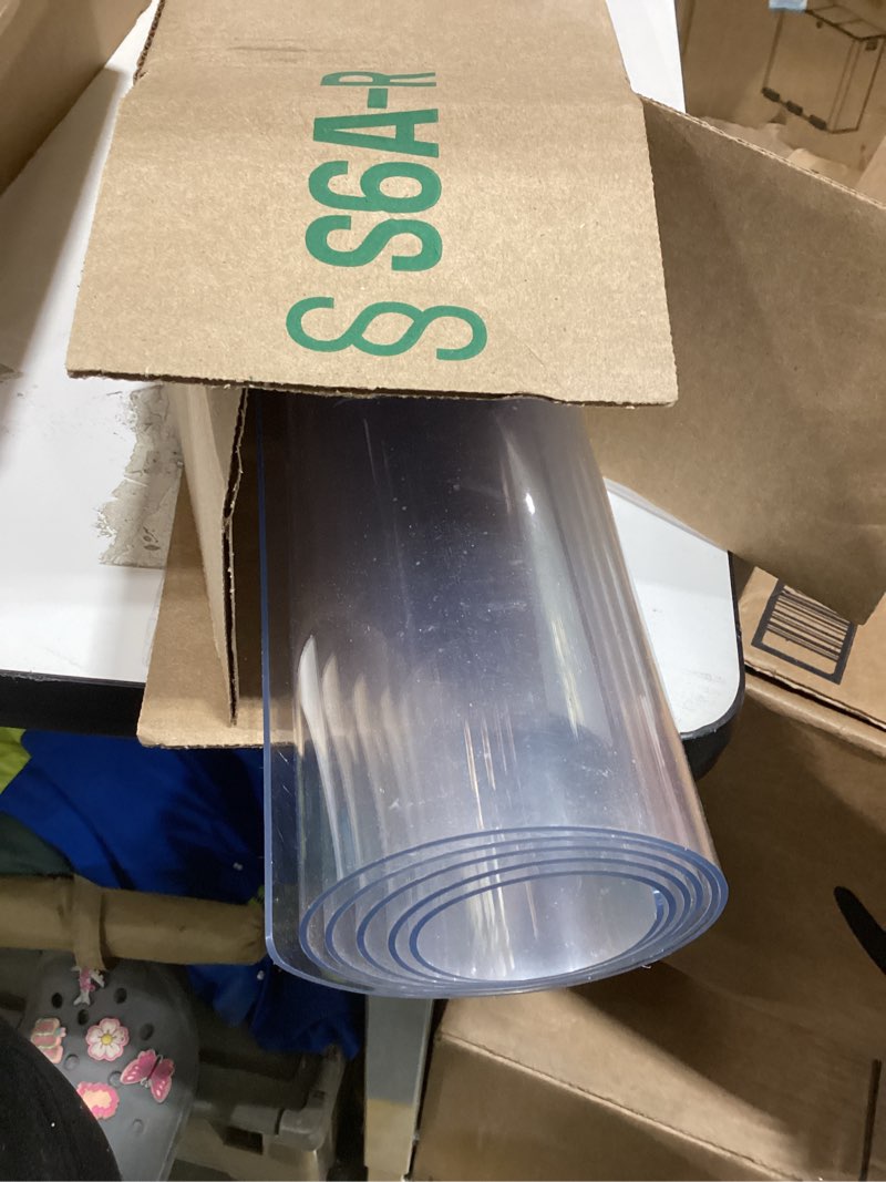 Condition photo showing As Is for Royhom Clear Table Protector 24 x 48 Inch - 2mm Thick Plastic Table Cover, Clear Table Cover Protector Rectangle, Waterproof PVC Desk Mat for Coffee Table, Writing Desk, Dining Room, Dresser 24" x 48" (Rectangular) Clear 2mm