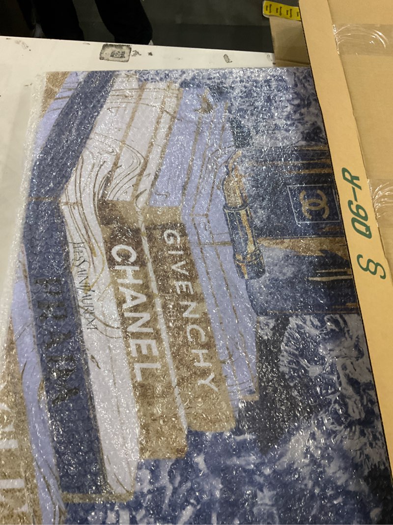 Condition photo showing New/Like New for Stupell Industries Fashion Book Pile Glam Designer Accessories Blue Gold, Designed by Ziwei Li Wall Art, 24 x 24, Canvas 24"L x 1"W