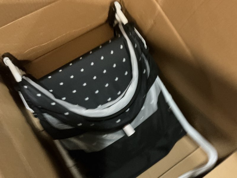 Condition photo showing Good Condition for dream on me karley bassinet, award winner lightweight travel baby bassinet, foldable bedside sleeper, adjustable double canopy, spacious design, soft fabric, storage basket – black and white