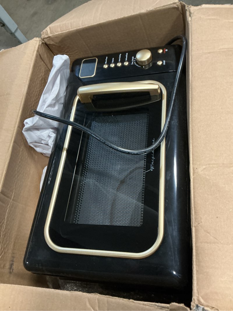 Condition photo showing Good Condition for frigidaire emw788retro 0.7 cu. ft. retro microwave, black-gold retro black