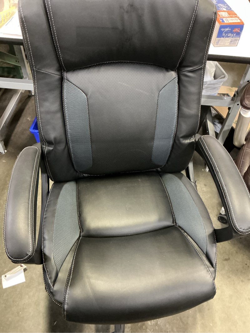 Condition photo showing Good Condition for serta mid back lumber support and swivel office desk chair, black