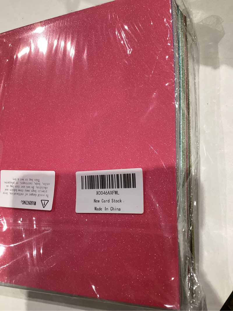 Condition photo showing New/Like New for OcePor Glitter Cardstock, 105 Sheets in 35 Colors Cardstock, Glitter Paper for Cricut, Crafts and DIY, 8.5”x11”Shimmer cardstock for Birthday, Wedding Party Decor(92 lb/250 gsm) 105 Sheets-35 Colors