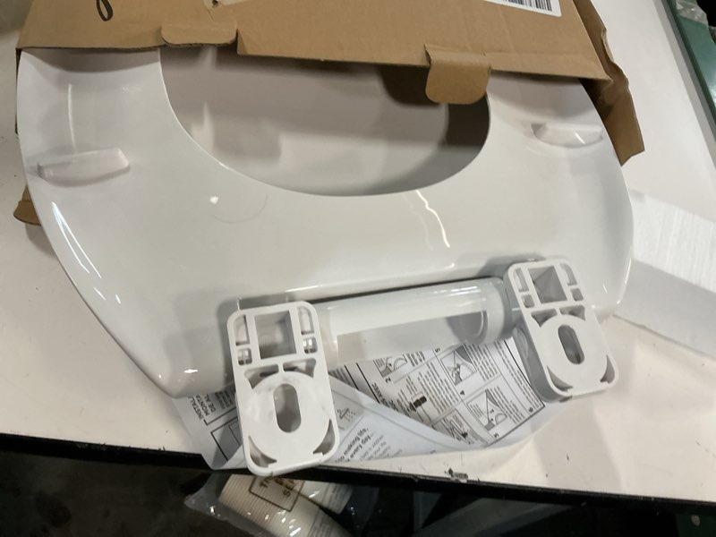 Condition photo showing As Is for american standard 5503a00b.020 transitional slow-close elongated front toilet seat, white