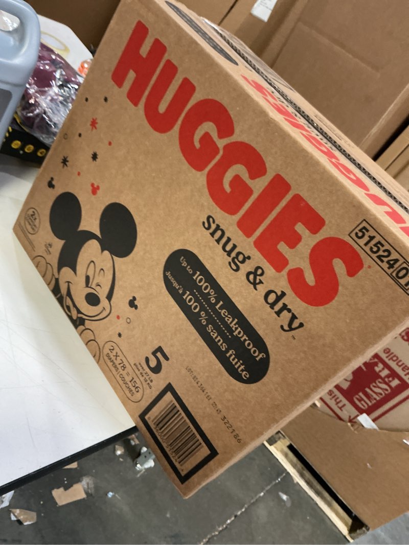Condition photo showing New/Like New for Huggies Size 5 Diapers, Snug & Dry Baby Diapers, Size 5 (27+ lbs), 156 Count (2 Packs of 78), Packaging May Vary Size 5 156