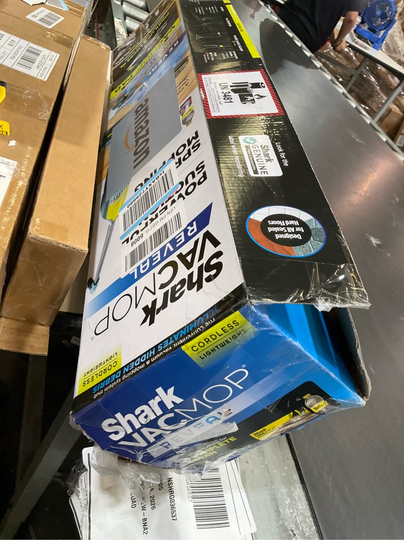 Condition photo showing As Is for shark vacmop reveal new cordless hard floor cleaner, vacuum & spray mop, powerful suction, lightweight, illumination light, includes 4 disposable pads, 12oz pet multi-surface cleaning solution, vm401 new vacmop reveal with 4 pads