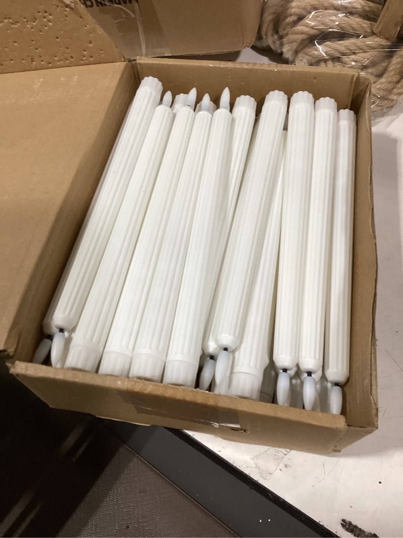 Condition photo showing As Is for treela 36 pieces flameless taper candles flickering faux led battery operated electric fake candles for christmas halloween birthday wedding party(white,0.8x11 inches,roman column) white 0.8x11 inches roman column