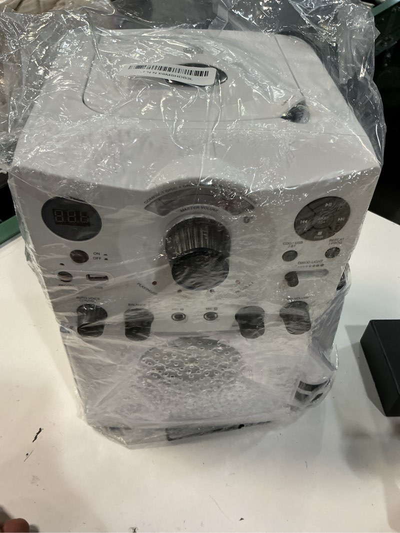 Condition photo showing Good Condition for singing machine sml385uw bluetooth karaoke system with led disco lights, cd+g, usb, and microphone, white