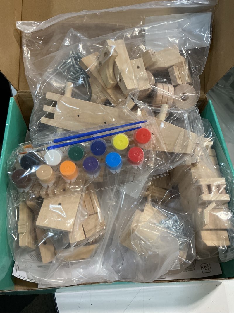 Condition photo showing Good Condition for kraftic woodworking building kit for kids, with 3 educational diy carpentry construction wood model kit toy projects for boys and girls- tractor, bulldozer and racing car construction set of 3