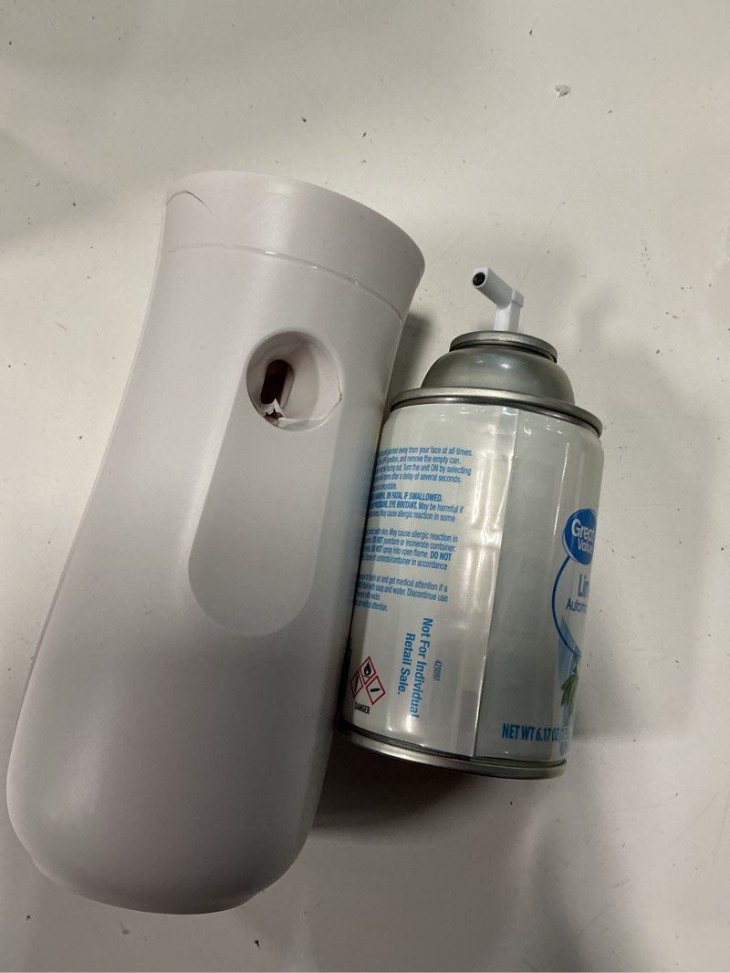 Condition photo showing As Is for great value automatic air freshener spary kit w/1 refill included, linen fresh, 2 pieces